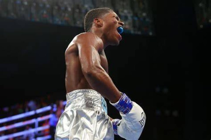Ford rallies to dramatically stop Kholmatov in final seconds for title